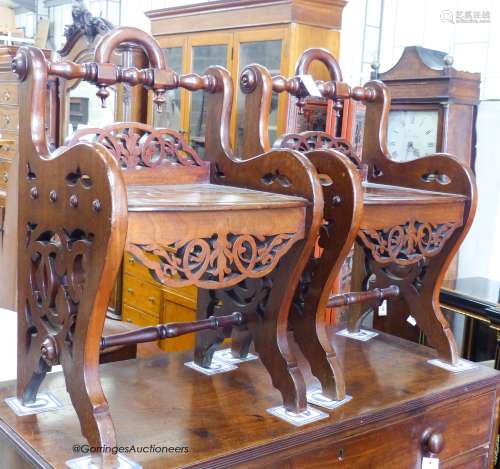 A pair of Victorian style mahogany hall seats in the manner ...