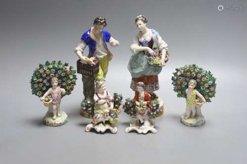 Two pairs of Samson style figures and a pair of German figur...