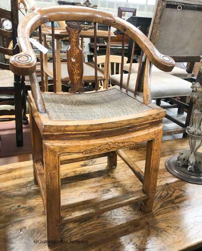 A Chinese elm stickback elbow chair, width 62cm, depth 42cm,...