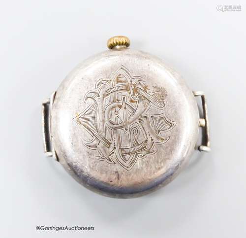 An early 20th century silver Rolex manual wind hunter trench...