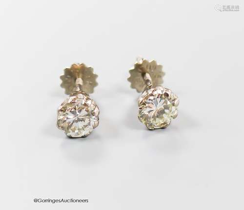 A modern pair of 18ct and solitaire diamond set ear studs, e...