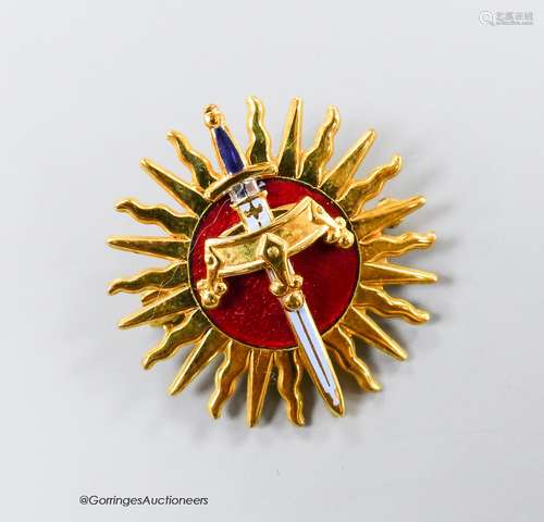 A modern 9ct gold and red enamel brooch, modelled as a sword...