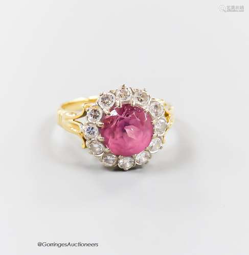 A modern yellow metal, pink tourmaline and diamond set circu...