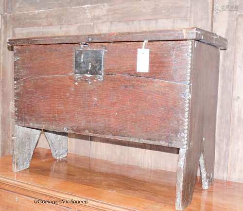 A 17th century oak six-plank coffer of small proportions,the...