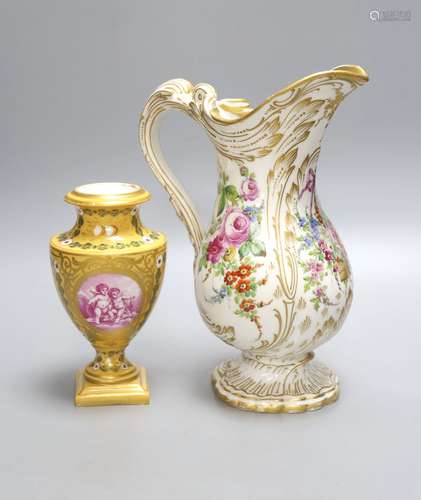 A Limoges floral and gilt painted jug and vase, tallest 24cm