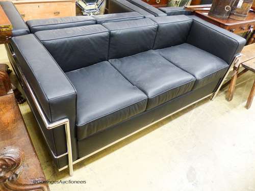 A Corbusier style chrome and black leather three seater sofa...