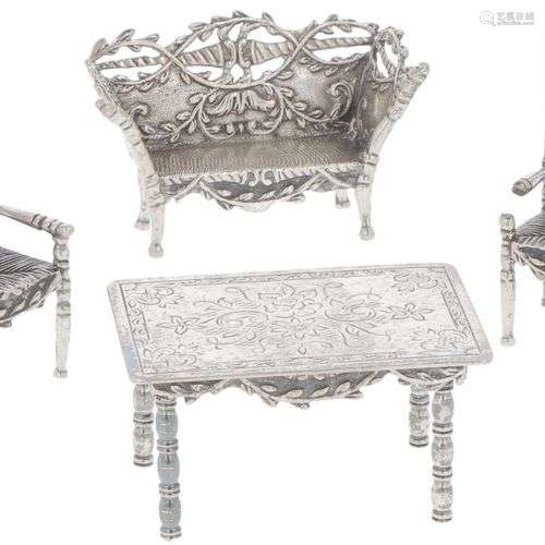 (4) piece of miniature silver furniture.