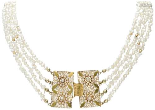 Four-row antique pearl necklace with a 14K. yellow gold fili...