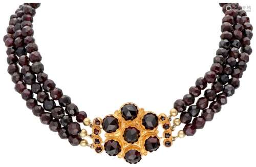 Three-row vintage garnet necklace with a 14K. yellow gold cl...