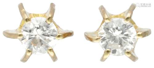 14K. Yellow gold solitaire ear studs set with approx. 0.10 c...
