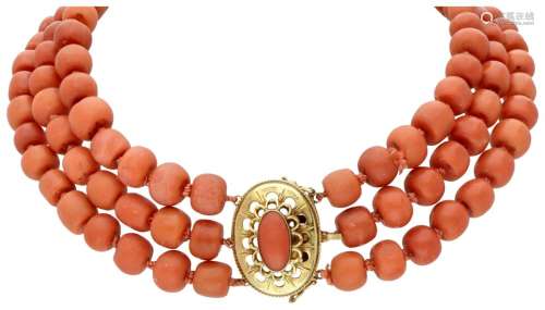 Three-row antique red coral necklace with a 14K. yellow gold...