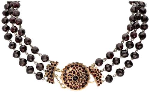 Three-row garnet altered necklace with an antique 14K. yello...
