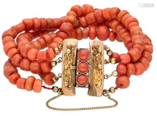 Four-row red coral bracelet with a 14K. rose gold closure.