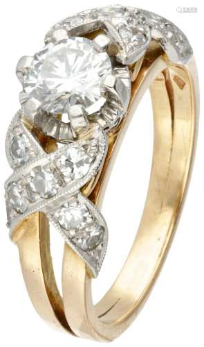 18K. Bicolor gold Art Deco ring set with approx. 0.84 ct. di...