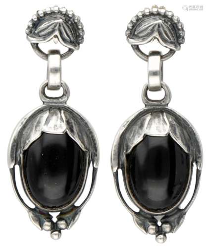 Silver Georg Jensen earrings of the year 2010, set with blac...