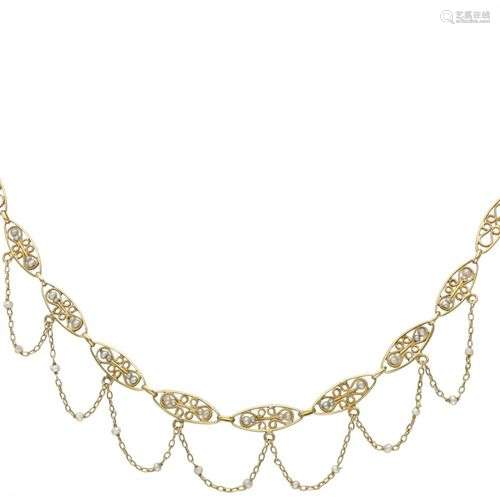 18K. Yellow gold filigree link necklace set with seed pearls...
