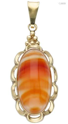 14K. Yellow gold openwork pendant set with red agate.