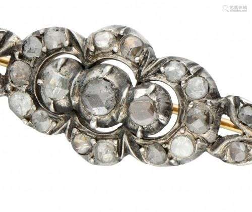 14K. Yellow gold and silver brooch set with rose cut diamond...