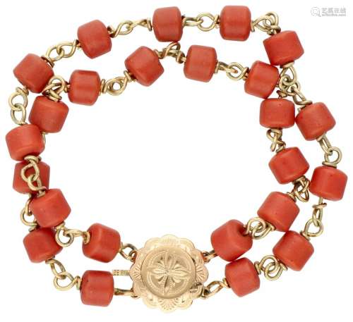 14K. Yellow gold two-row bracelet with red beads.