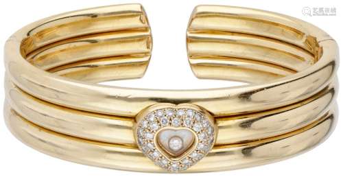18K. Yellow gold Chopard 'Happy Diamonds' bangle bracelet.