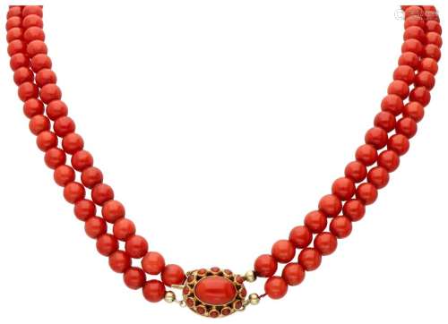 Two-row red coral necklace with a 14K. yellow gold closure.