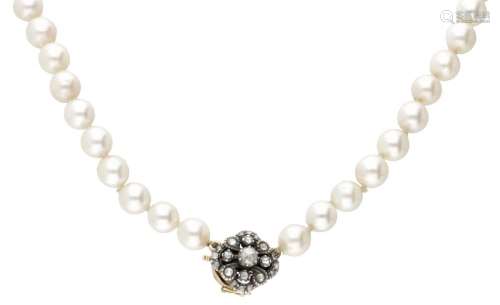 Vintage freshwater pearl necklace with a 14K. yellow gold cl...