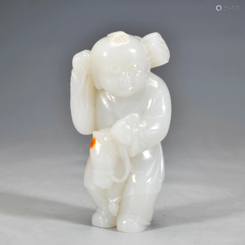 A Carved White Jade Kid Qing Dynasty