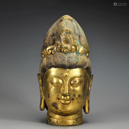 A Gilt-bronze Buddha Head