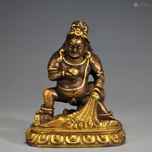 A Tibetan Gilt-bronze Standing Jambhala