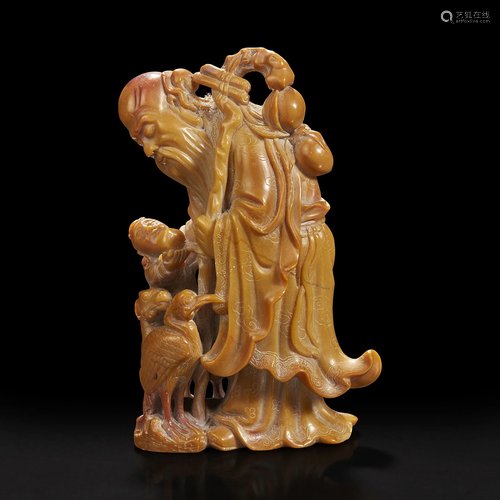 A Chinese carved soapstone figure of Shoulao 寿