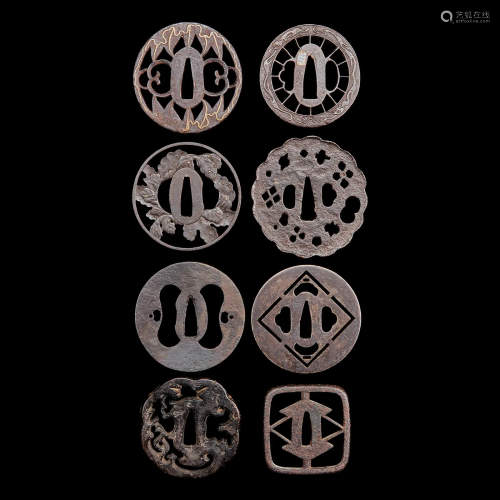 A group of eight Japanese pierced iron tsuba 日