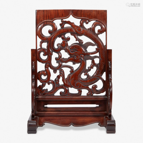 A Chinese carved and pierced huanghuali 