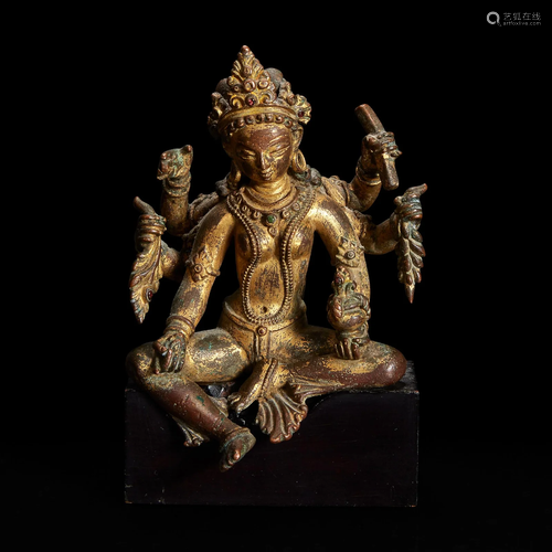 A Nepalese gilt copper alloy figure of Vasudhara