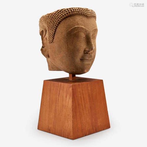 A Thai carved sandstone head of a Buddha泰国