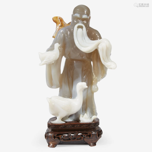 A Chinese carved agate figure of Wang Xizhi 玛