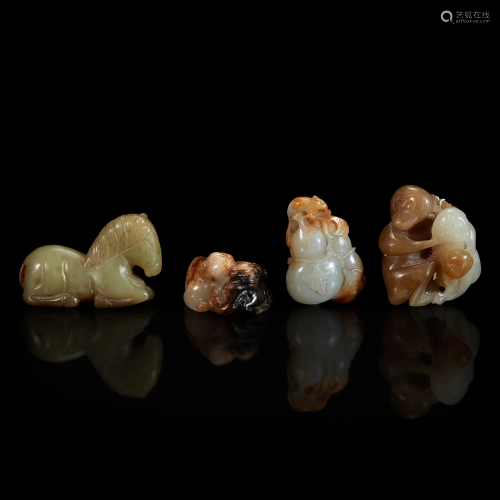 A group of four Chinese grey and brown jade items