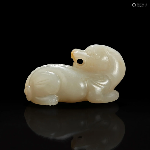 A Small Chinese carved grayish white jade figure of