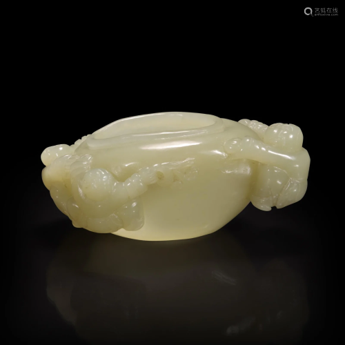 A Chinese carved creamy-white jade 