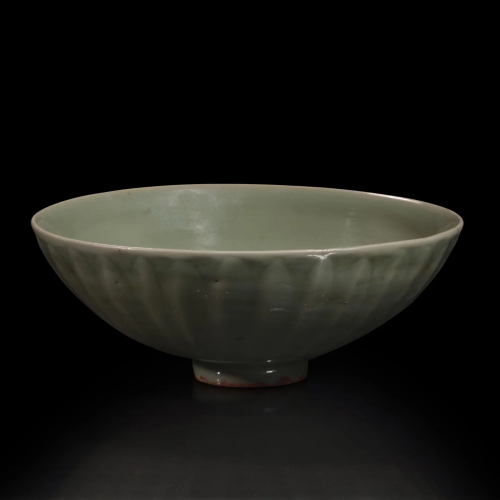 A Chinese Longquan celadon petal-carved 