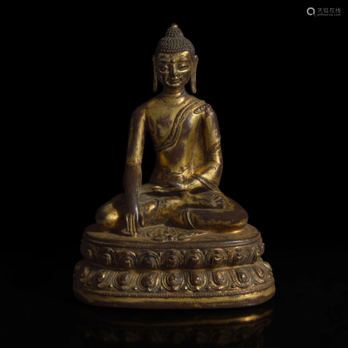 A Himalayan gilt copper alloy figure of Buddha