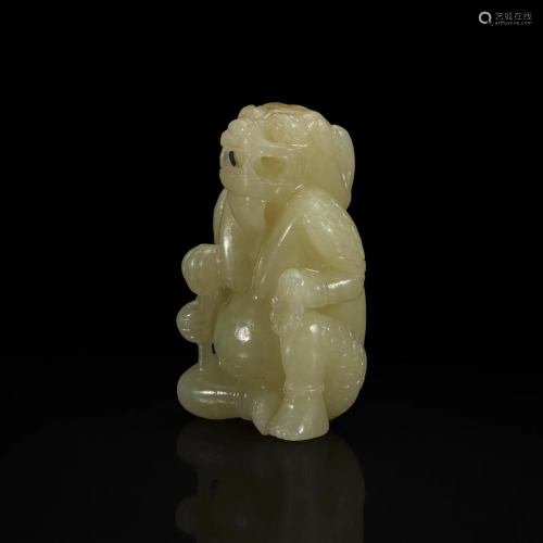 A Chinese Yellowish-pale celadon Jade Mythical Creature