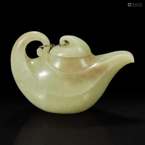A Chinese yellowish-celadon jade teapot and cover