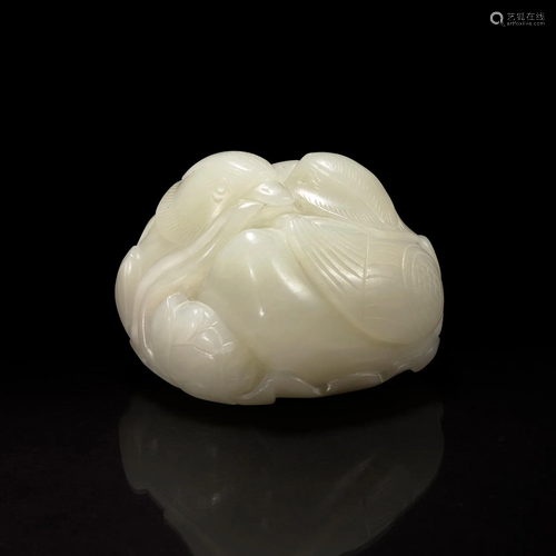 A Chinese white jade figural group depicting mandarin