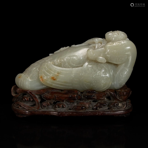 A Chinese celadon jade archaistic 