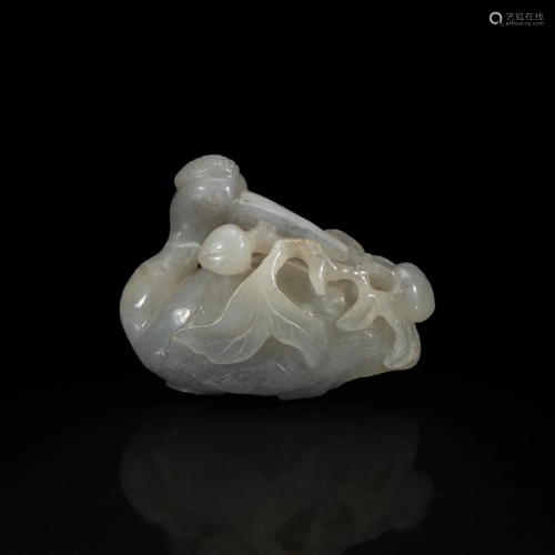 A Chinese pale grey jade crane and peaches group