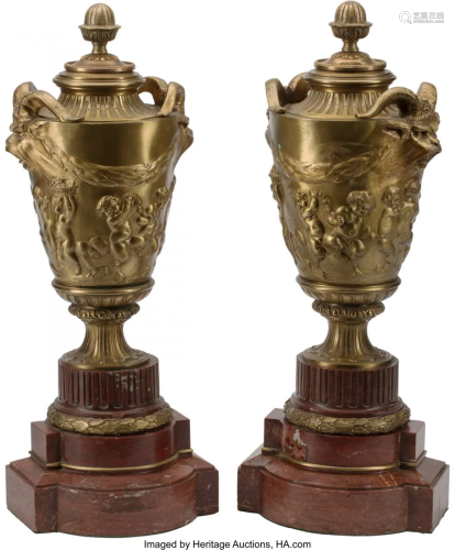 A Pair of French Gilt Bronze Urns on Rouge Marbl