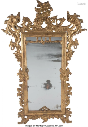 An Italian Baroque Carved and Giltwood Mirror, 1