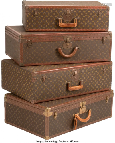 A Group of Four Louis Vuitton Hardside Suitcases