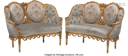 A Pair of French Regence-Style Carved Giltwood M