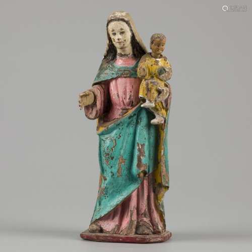 A polychrome sculpture of a Madonna and kind, Phillipines 19...